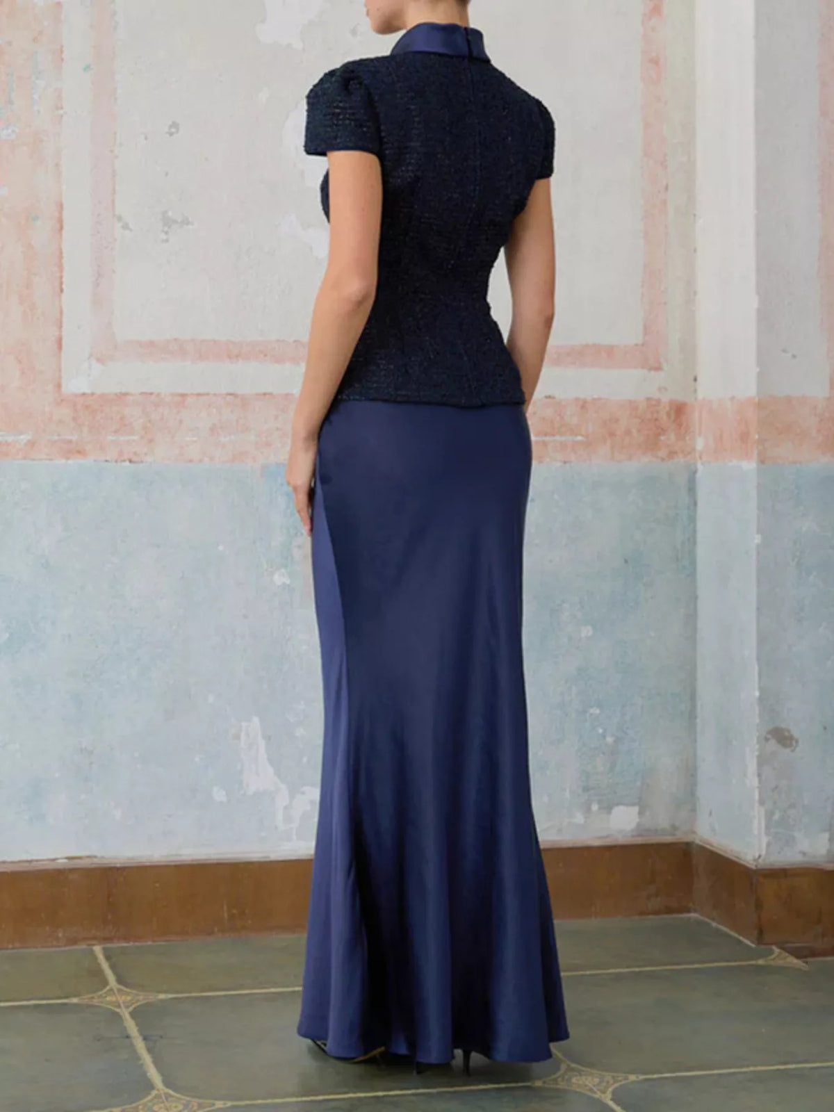 Coordinated navy tweed jacket and satin skirt set detail