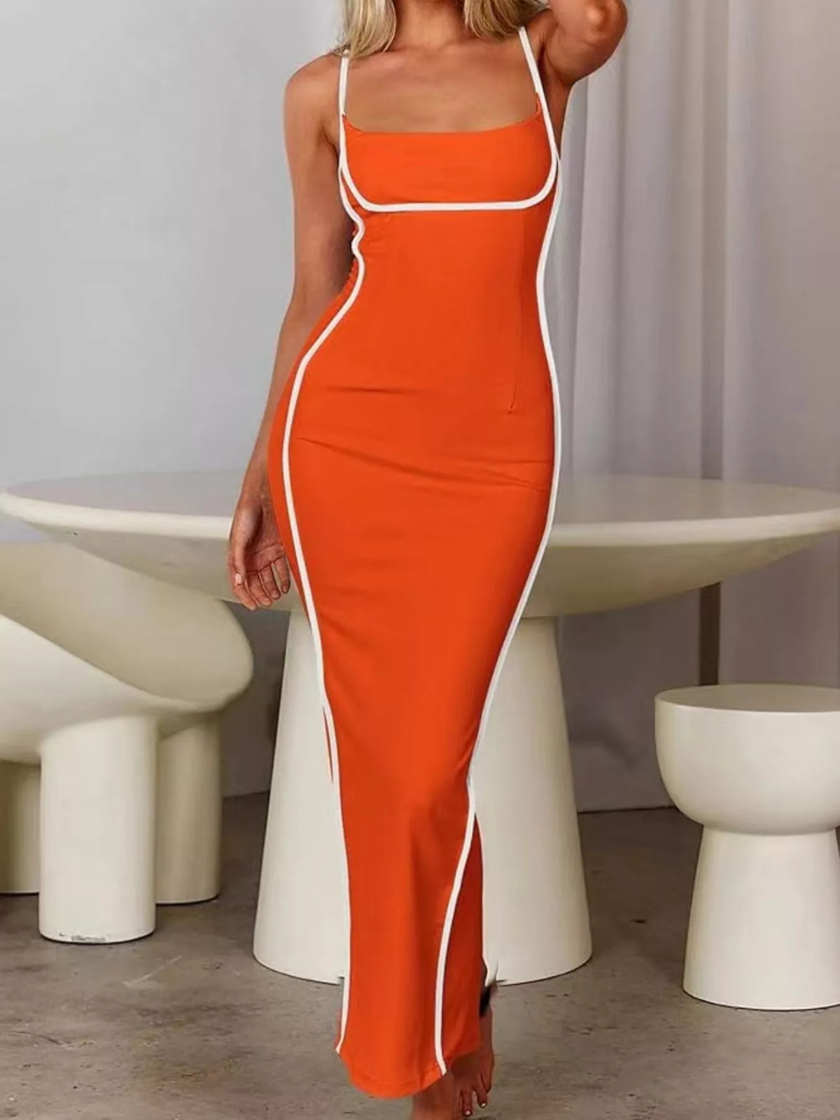 Spaghetti strap maxi dress shown at a side angle