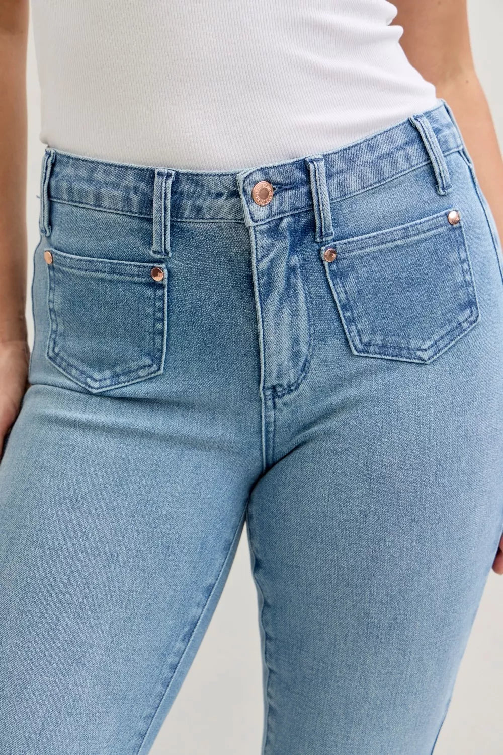 Judy Blue contrast wash bootcut jeans hem view