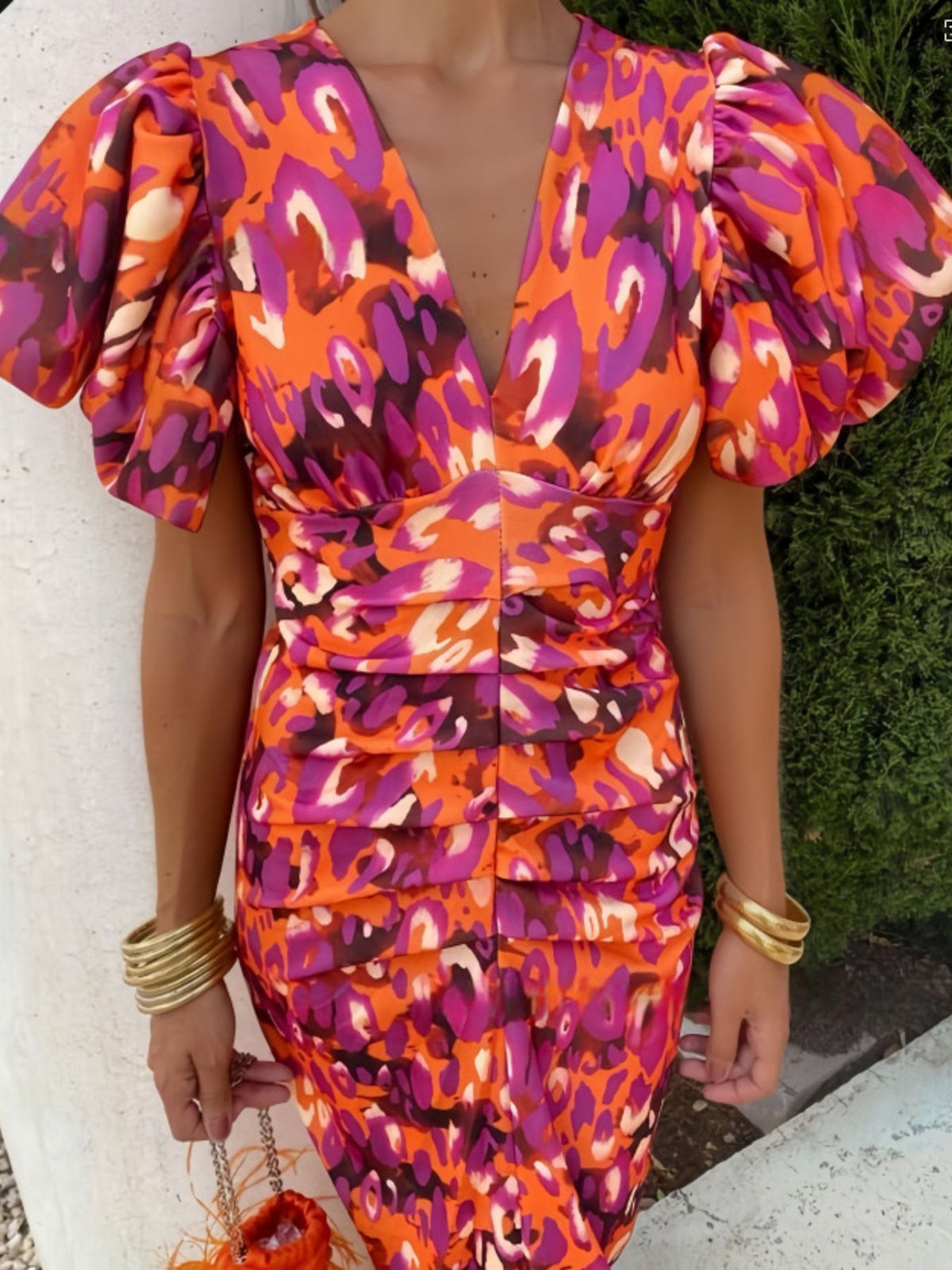 Three quarter view of the ruched dress