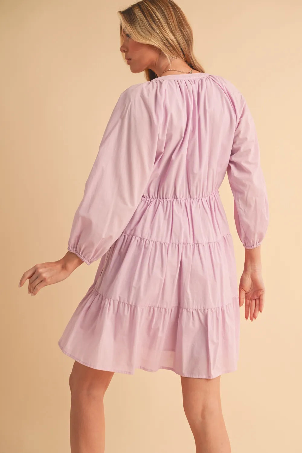Tiered mini dress on model styled look