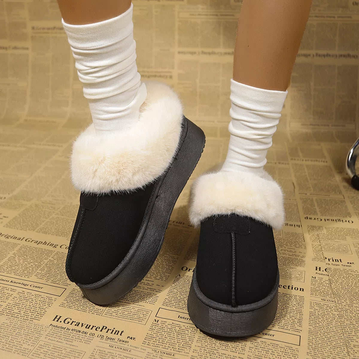Fuzzy trim platform boots angled studio shot