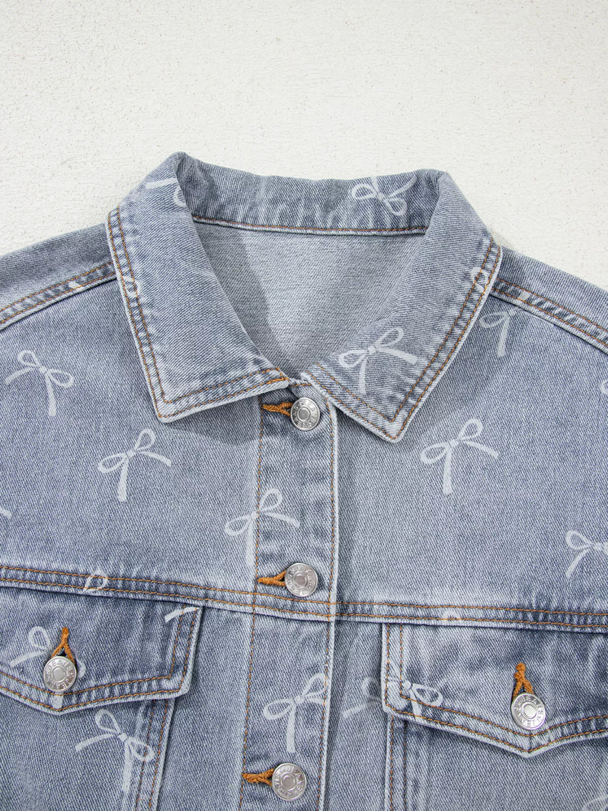 Bow Print Raw Hem Denim Jacket in Light Wash view 7