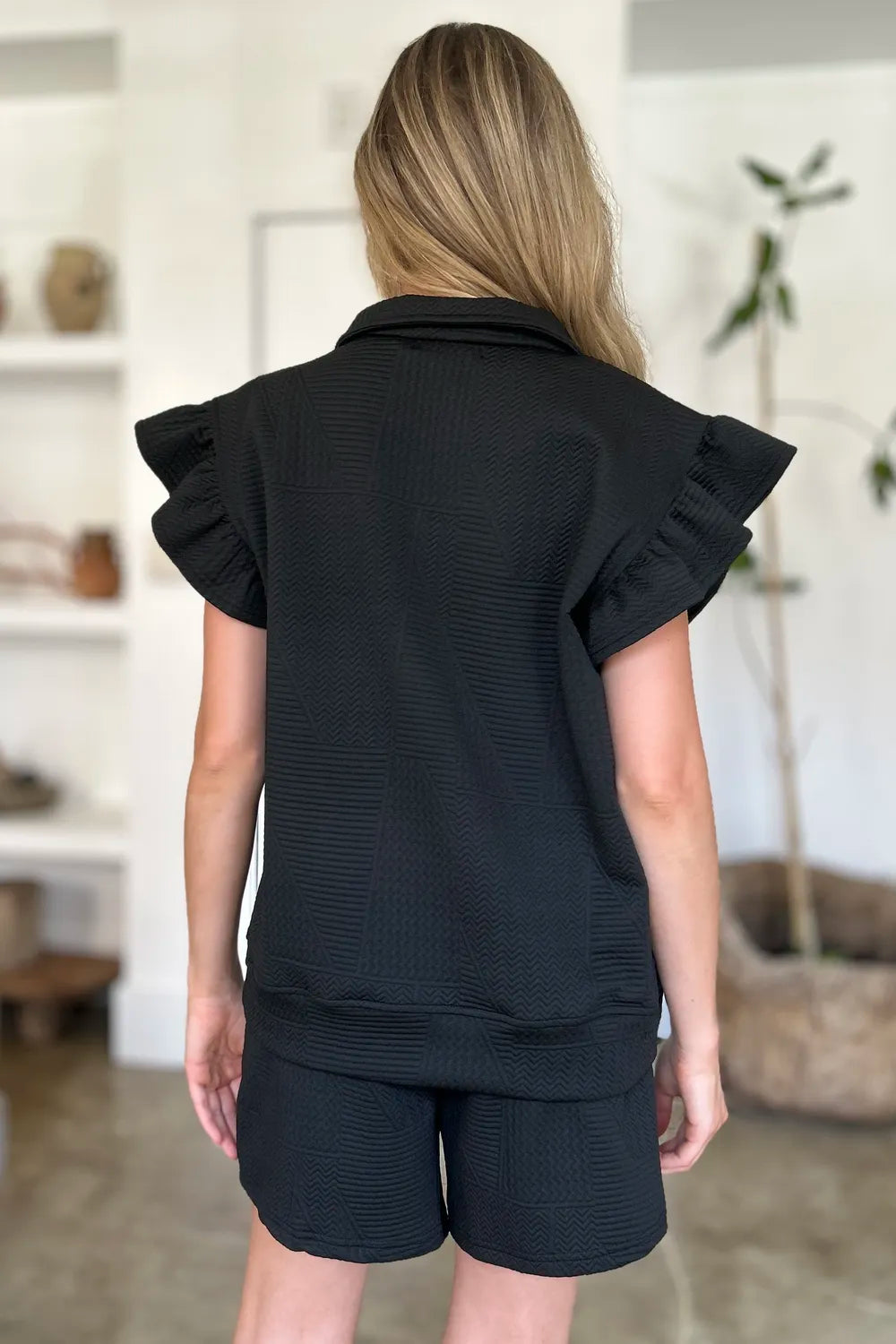 Double Take texture flounce sleeve top and shorts set front view on model