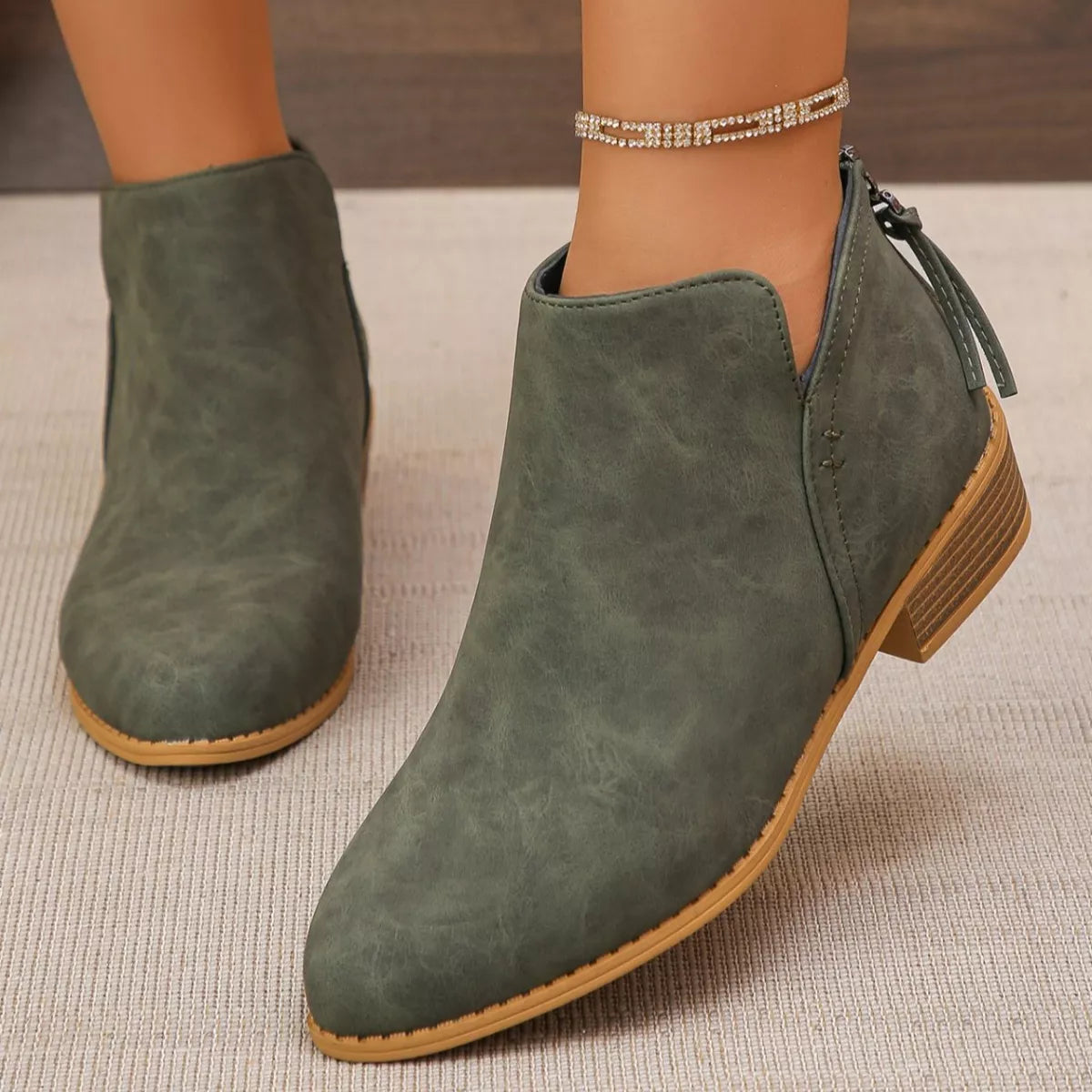 Point toe block heel ankle boots toe close up
