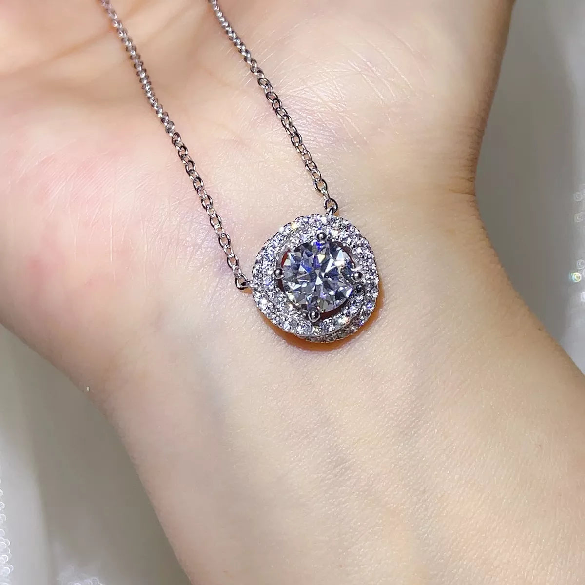 Sterling silver chain detail on moissanite pendant necklace