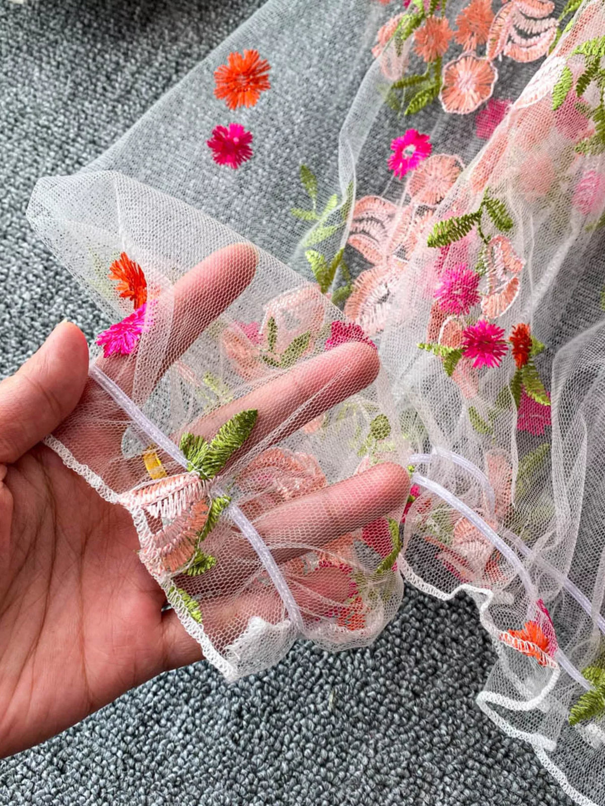 Sheer mesh sleeve styling detail