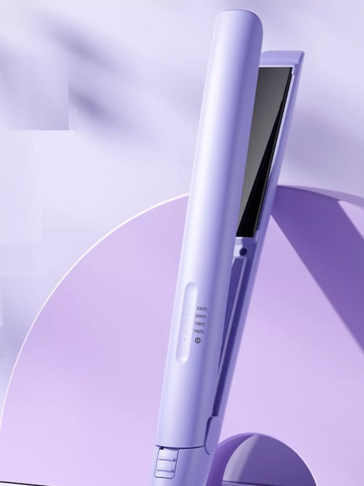 Hair straightener straightening a section of hair