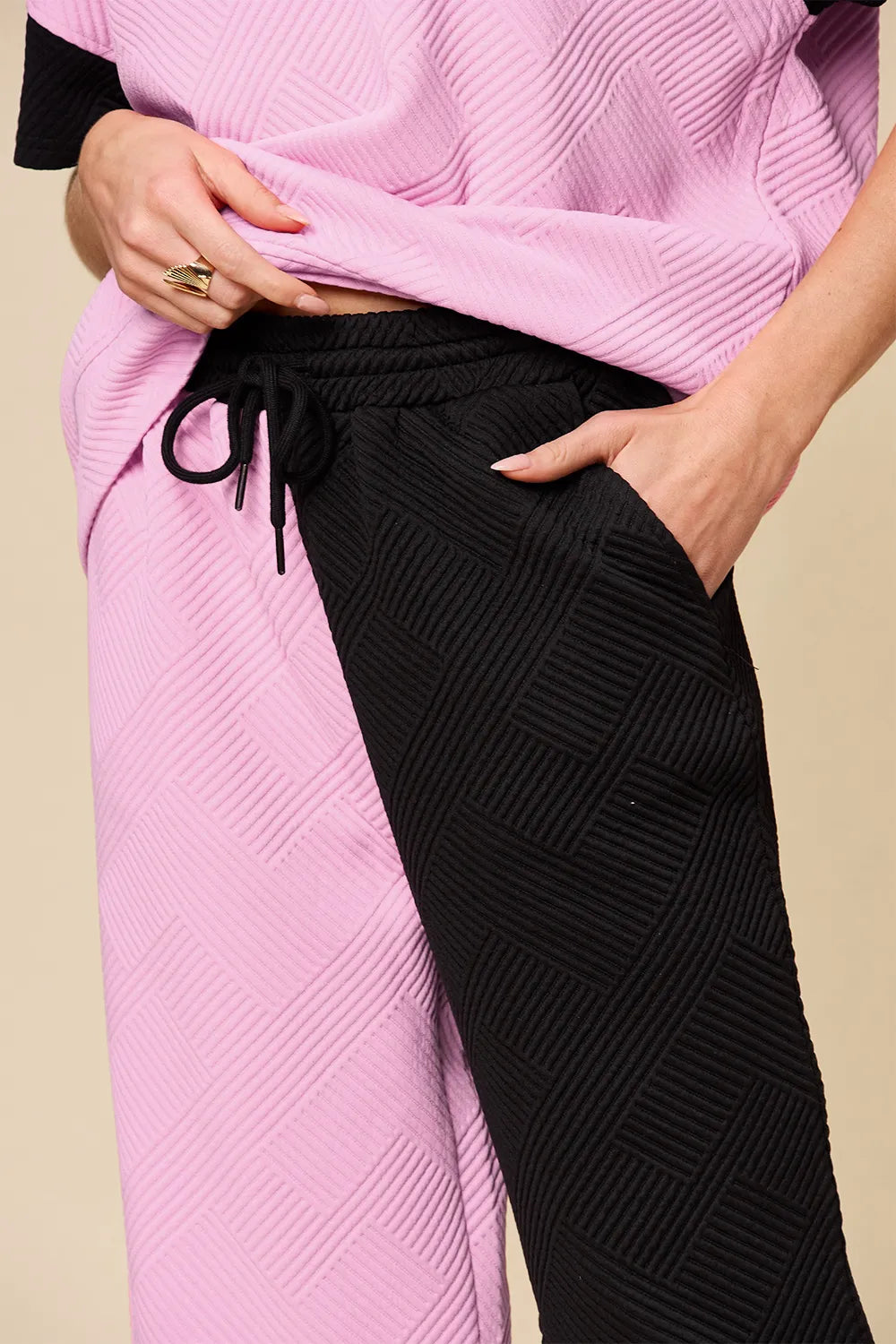 Back detail of the matching tee and pants