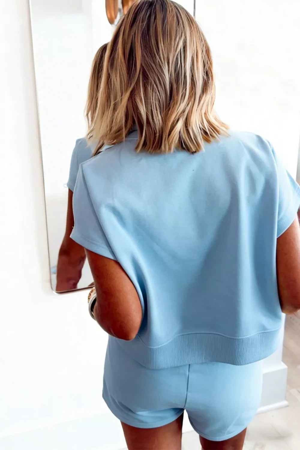 Pastel blue loose tee detail