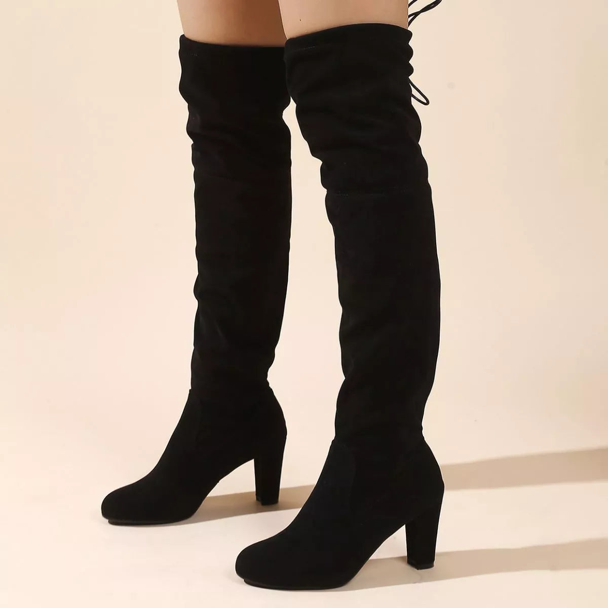 Over the knee high heel suede boots styled on model