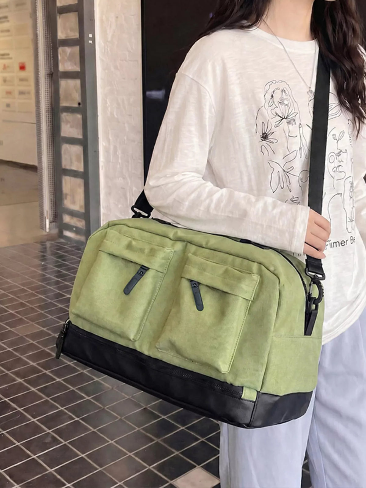 Oxford cloth travel bag front pocket detail