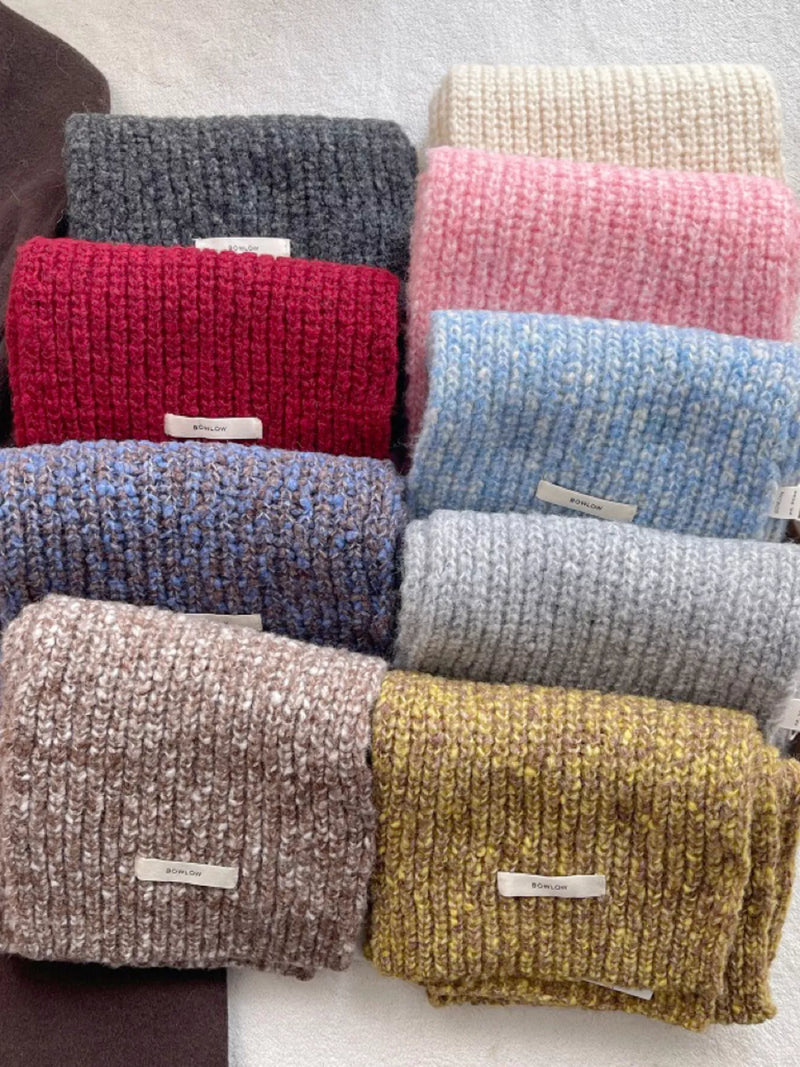Cozy knitted winter scarf wrapped at the neck