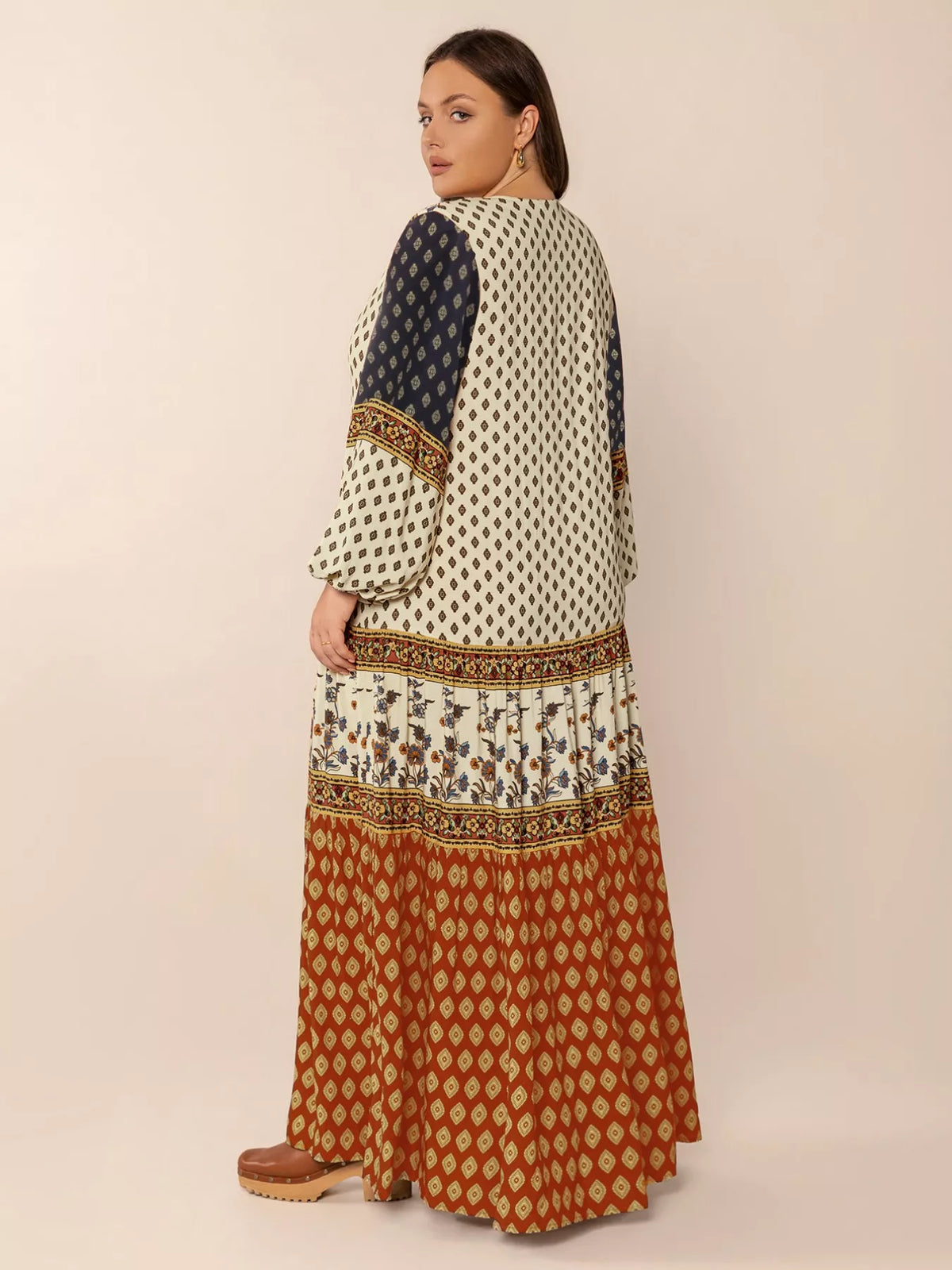 Balloon sleeve maxi dress styled with boots
