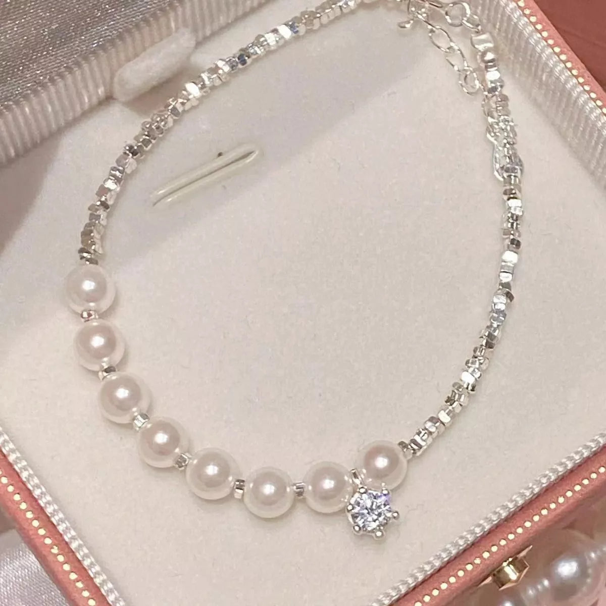 Sterling silver pearl bracelet detail view