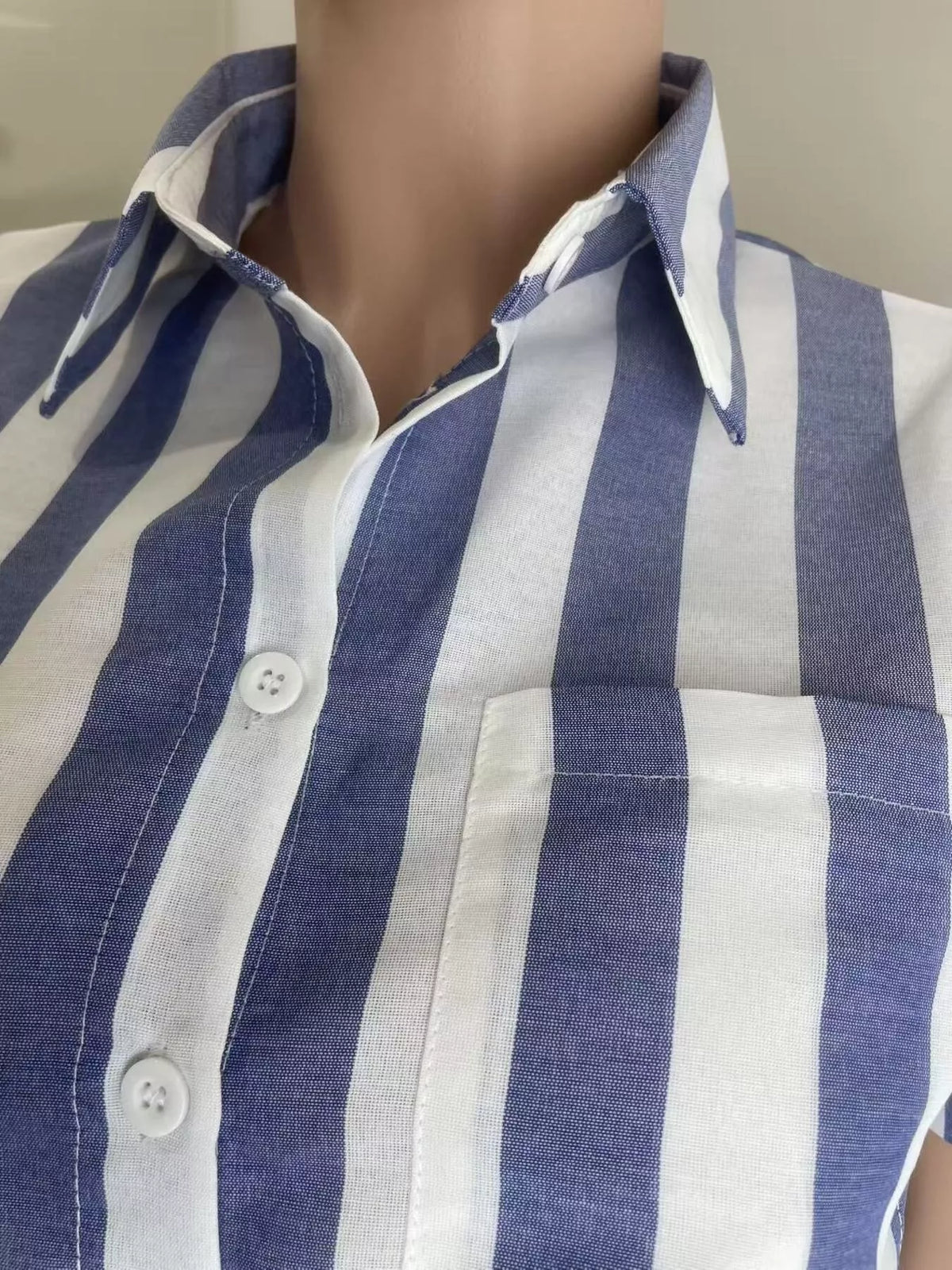 Striped button up top detail