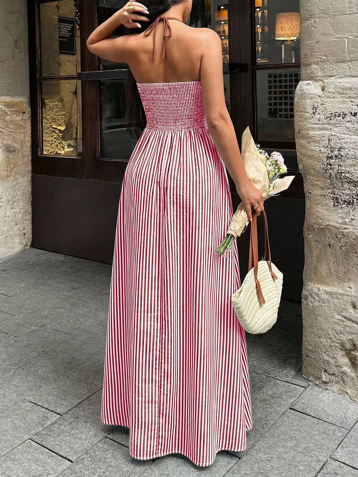 striped halter neck maxi dress hem detail