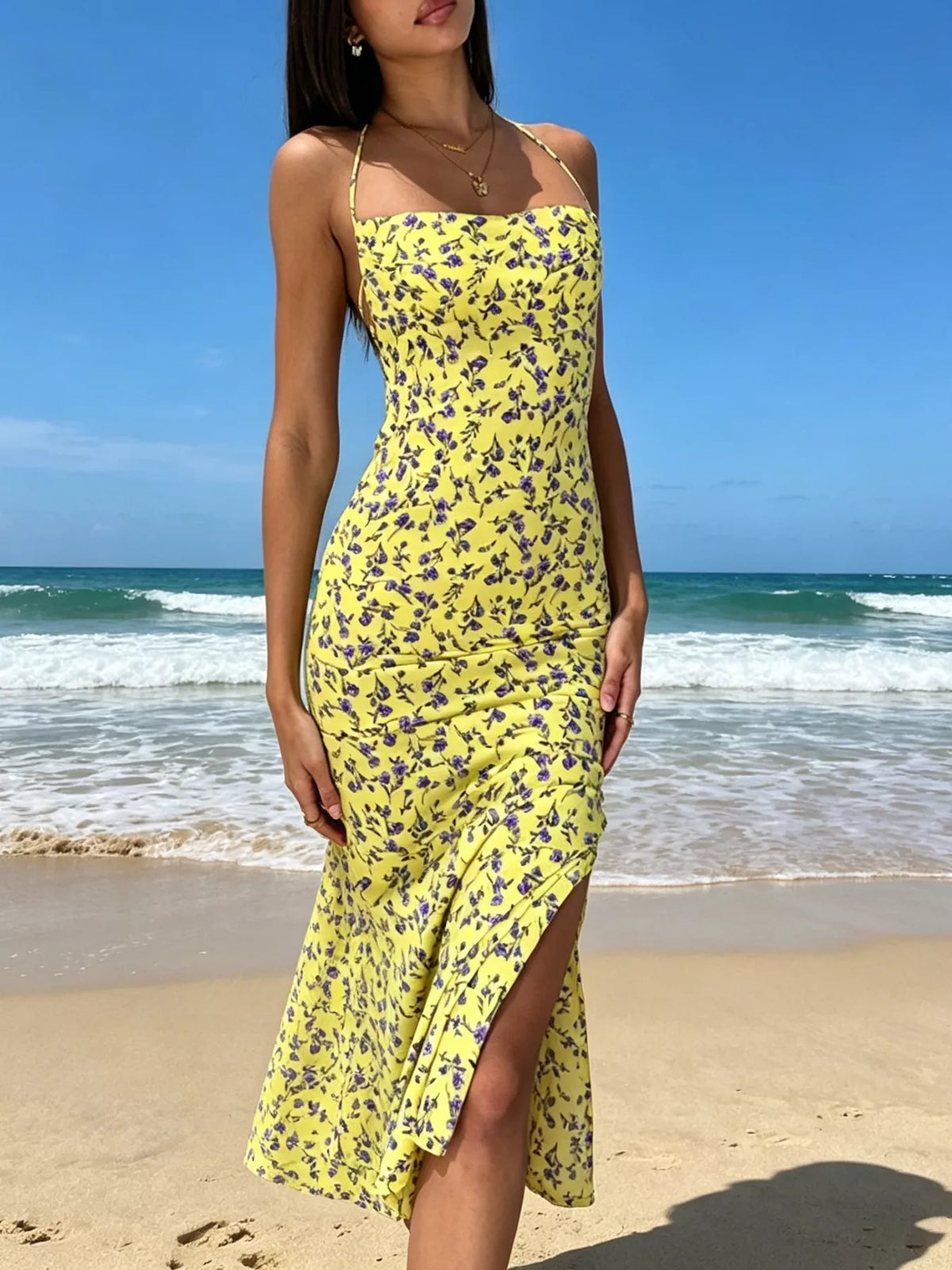Floral halter backless slit midi dress in yellow, front view