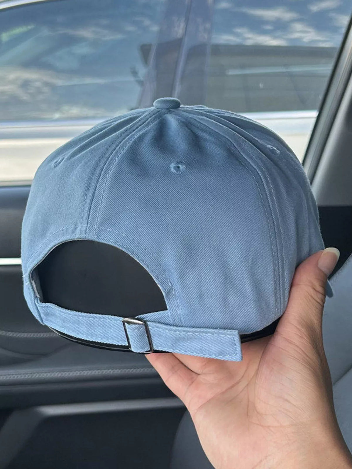 Navy blue slogan cap shown from the back