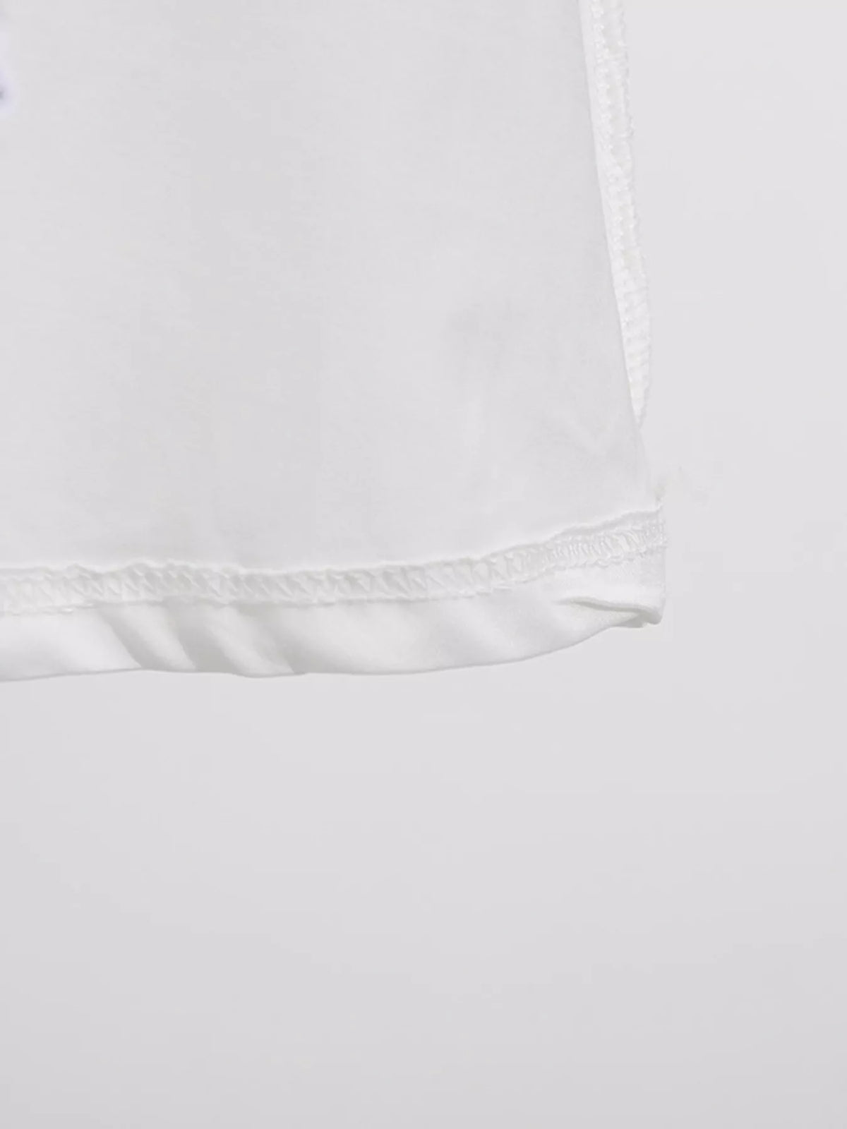 sleeveless floral applique off white midi dress detail view