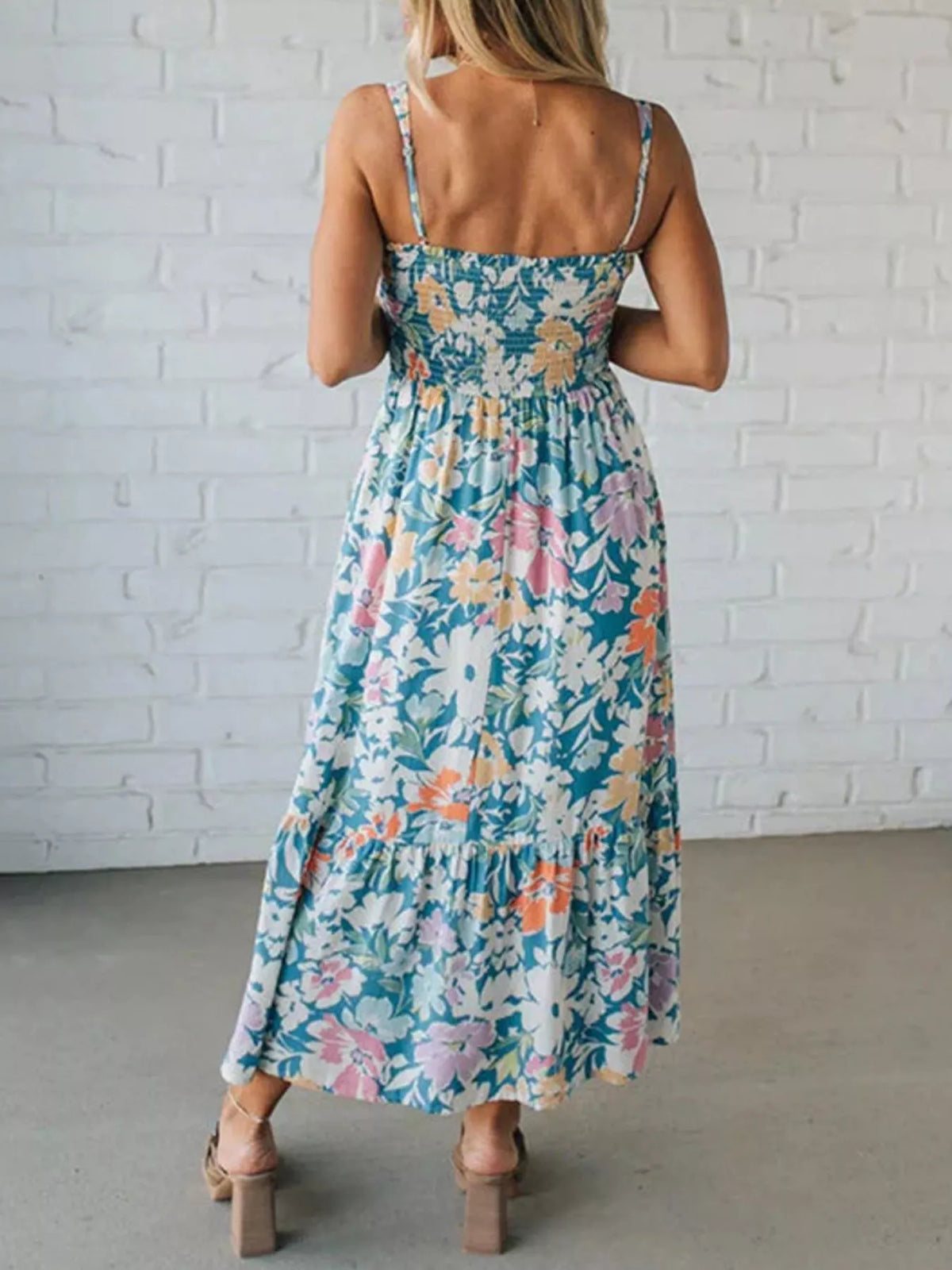 Back view of the womens blue smocked dress