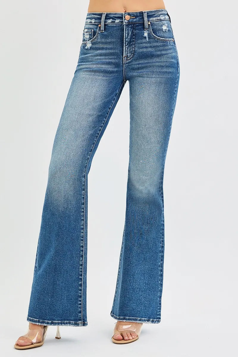 RISEN high rise flare jeans front view in dark blue wash