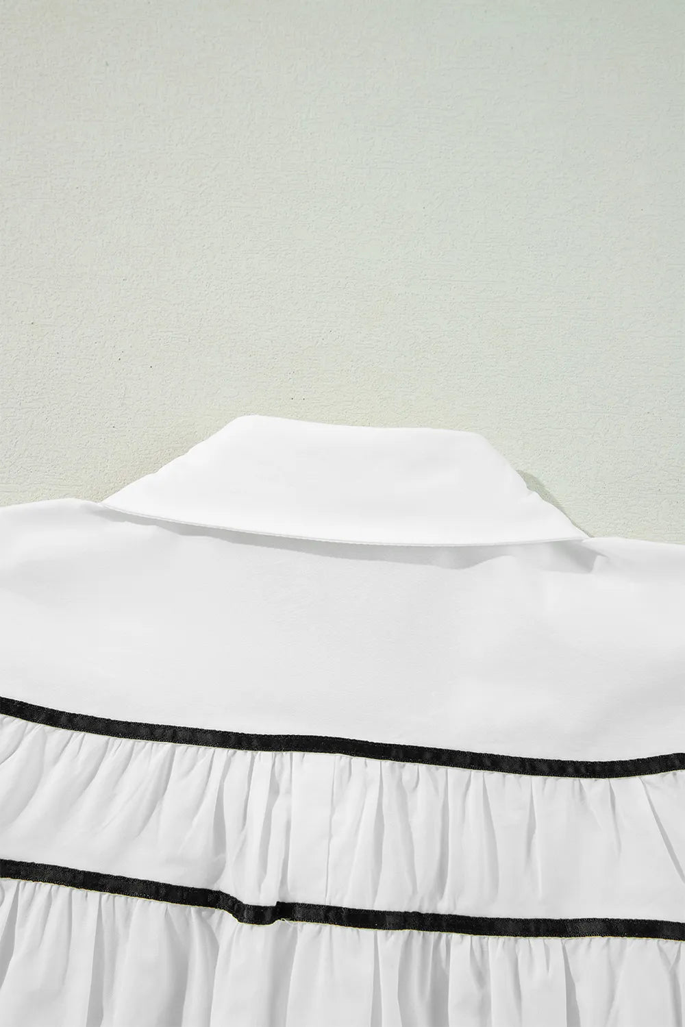 Bow collar shirt ruched detail close up