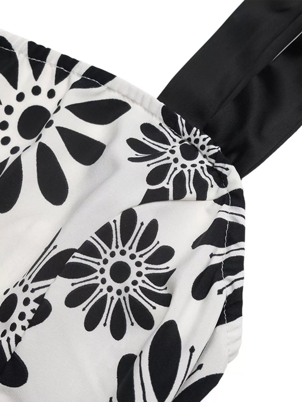 Black floral tie strap maxi dress, fabric and print close up