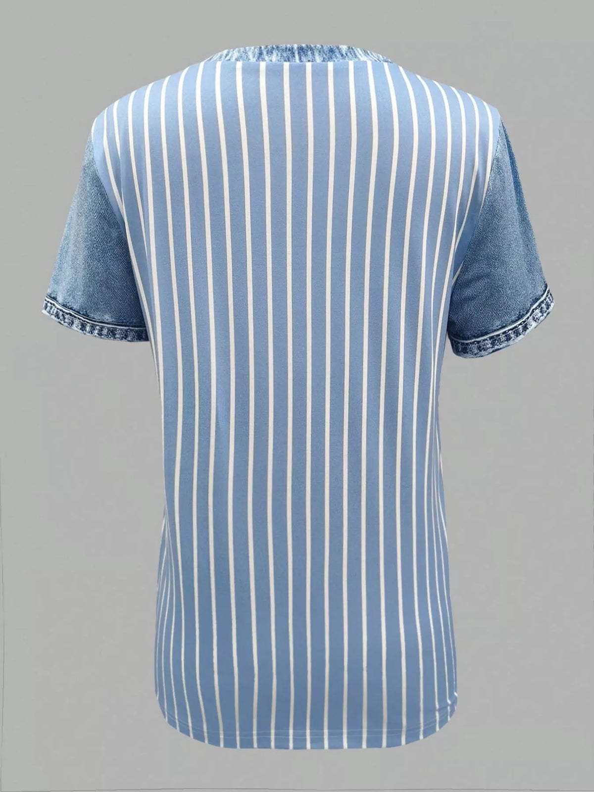 Patchwork print blouse styled with jeans full length view