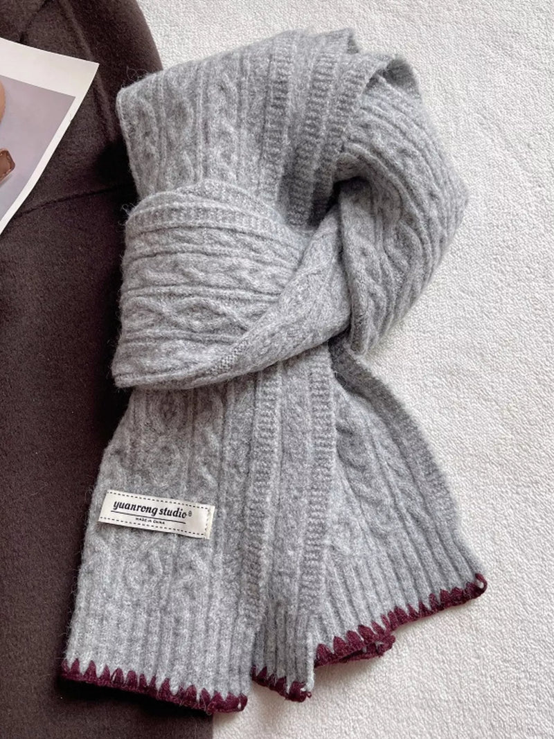 Grey cable knit contrast trim scarf shown at full length
