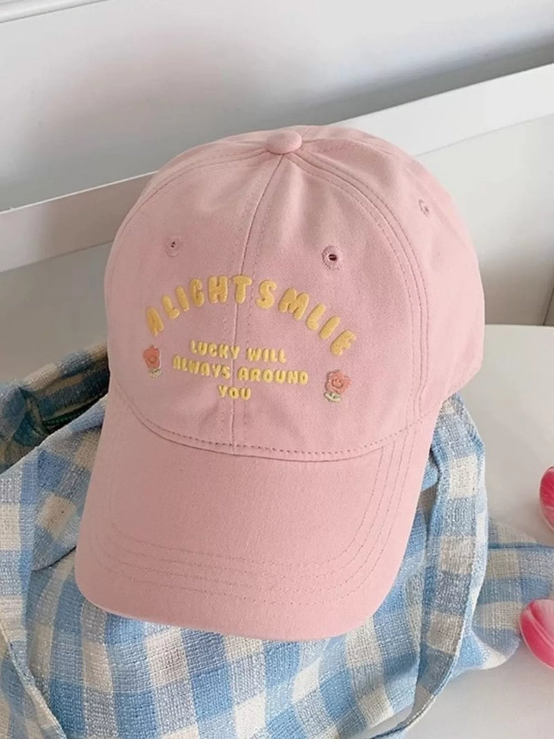 Embroidered cotton baseball cap, front view showing the stitching