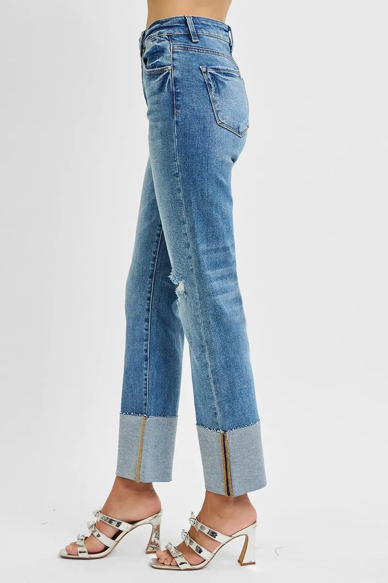 Close up of wide cuff and raw hem detail on RISEN jeans