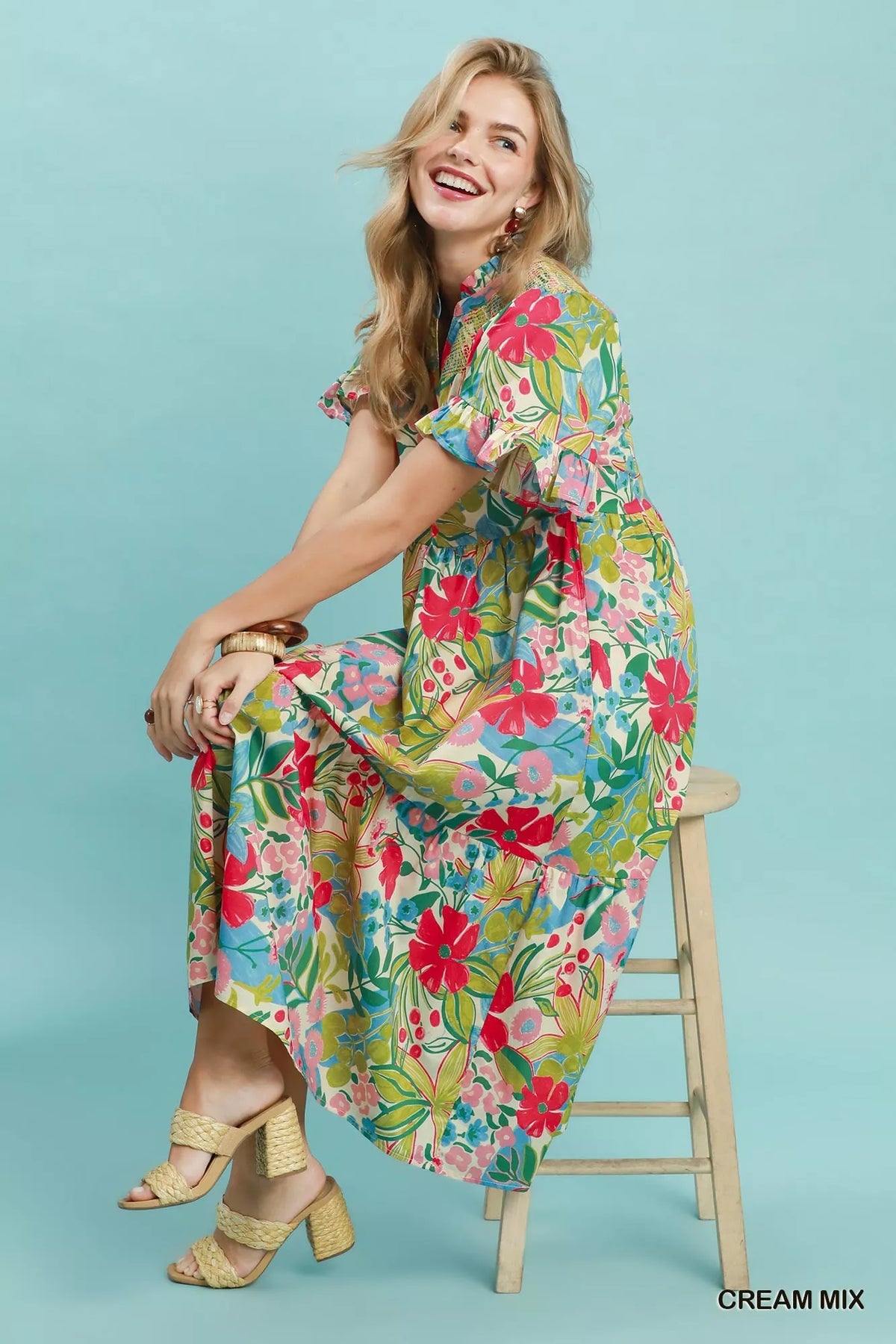 Cream tropical floral tiered midi dress with ruffle sleeves front view