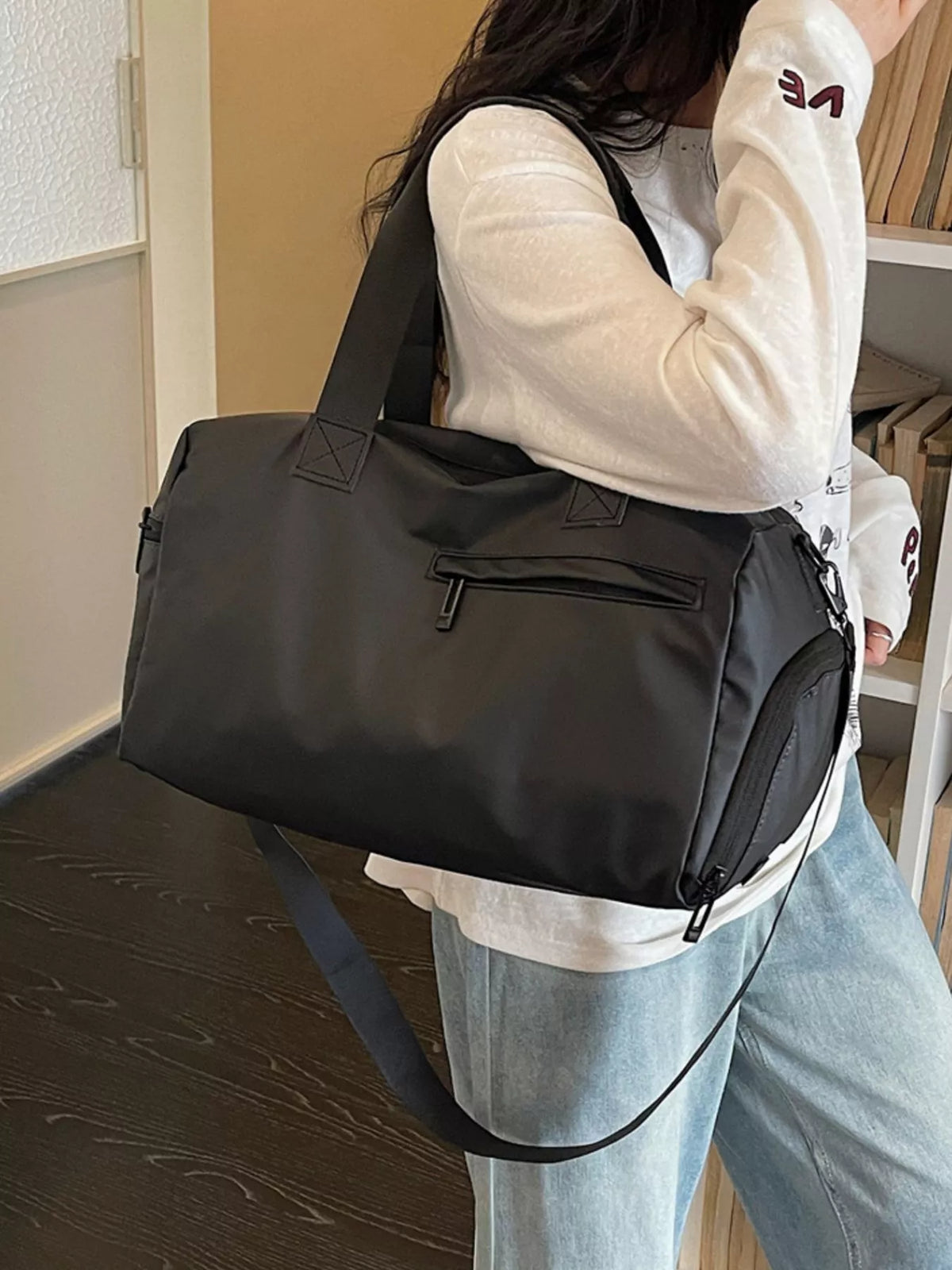 Black travel duffel bag interior view