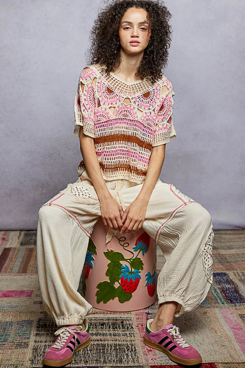 Open weave crochet top texture detail