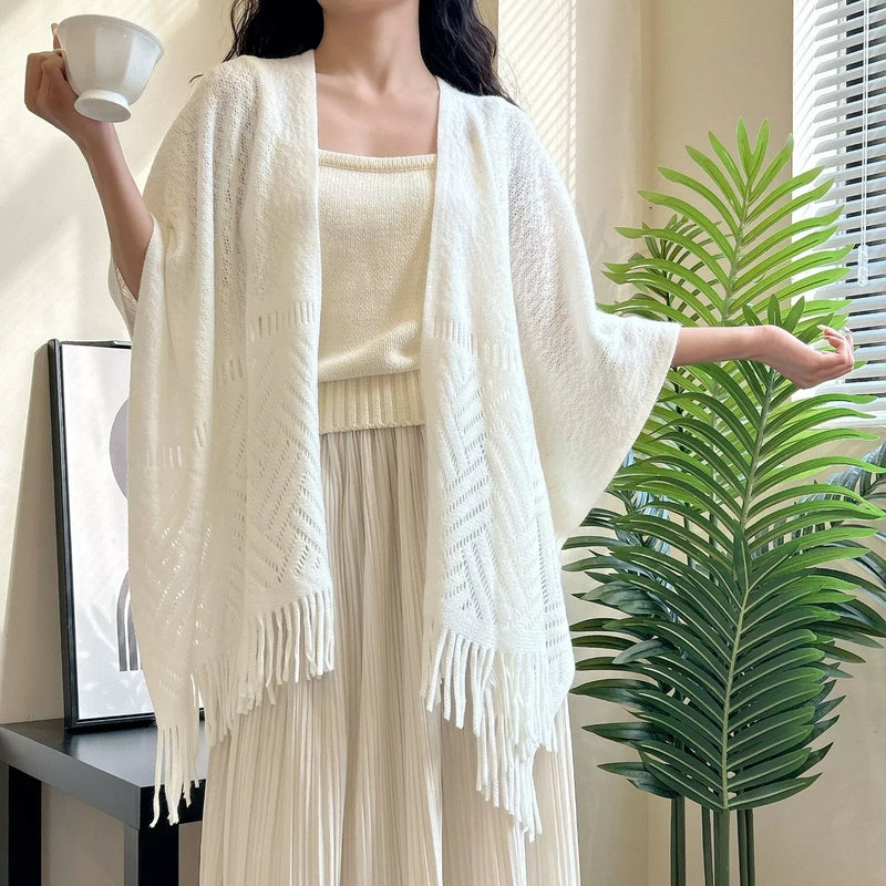 Knitted openwork fringe scarf shawl around the neck