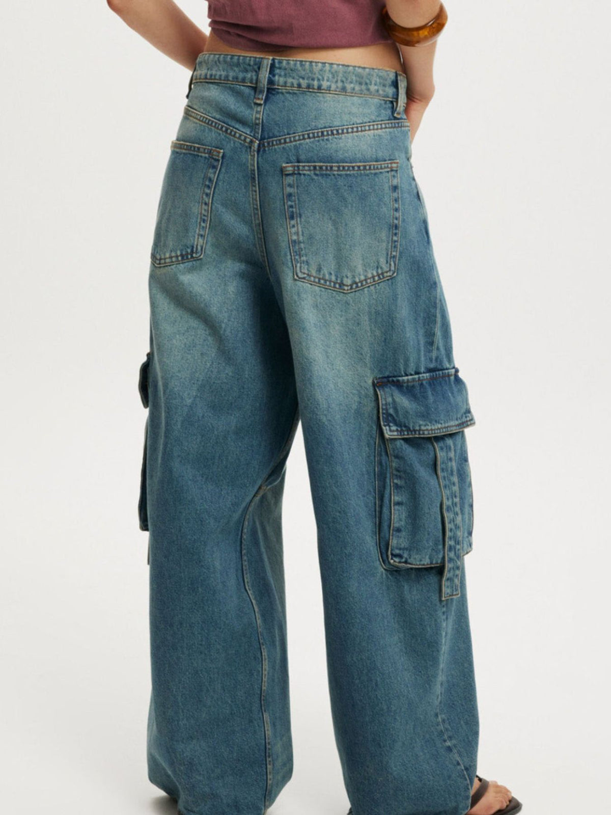 Blue cargo jeans back view