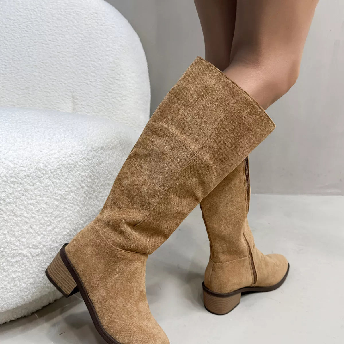 Brown round toe block heels boots upper texture detail
