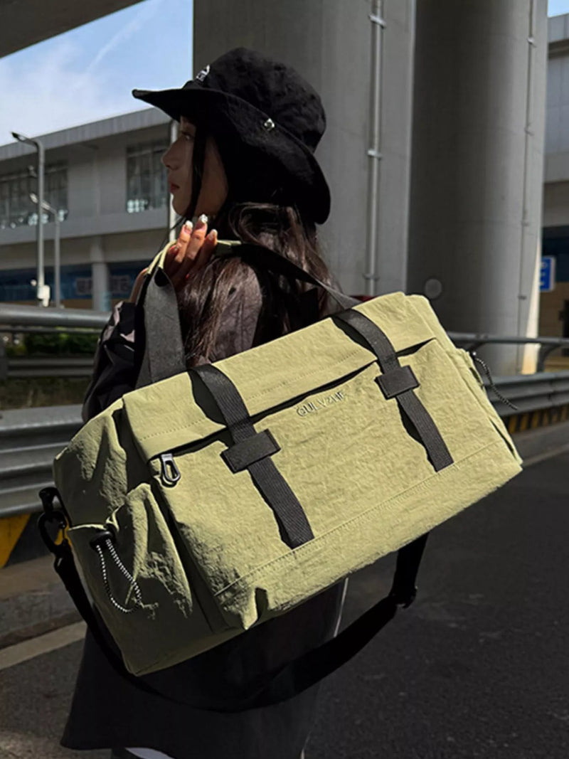 Large capacity travel bag front view in green
