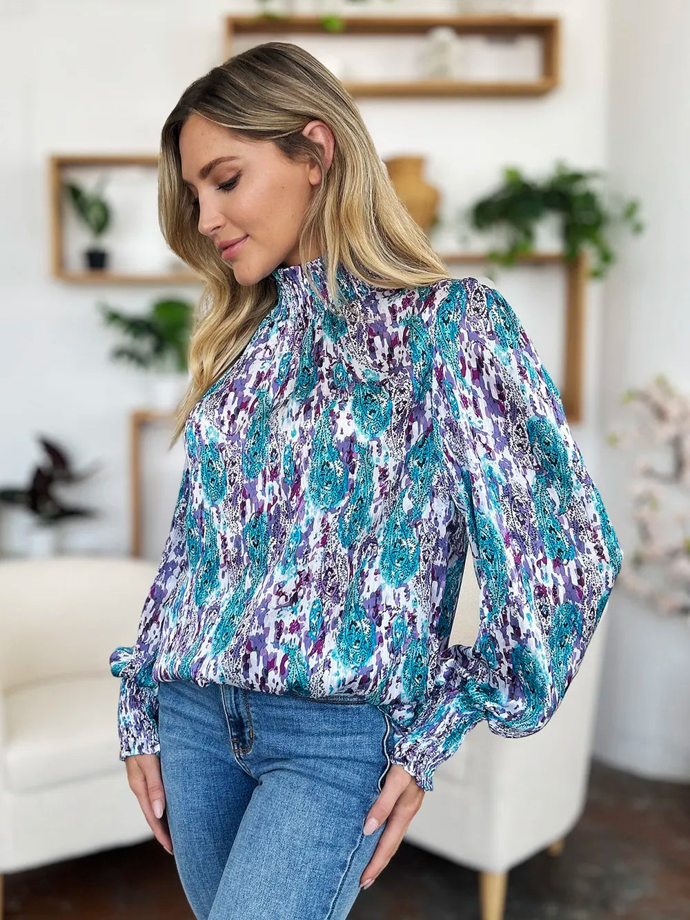 Three quarter view of the womens frill blouse