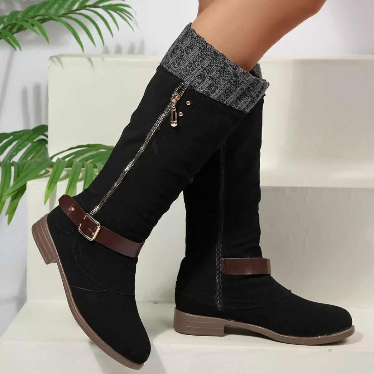 Red round toe block heels boots angled three quarter view