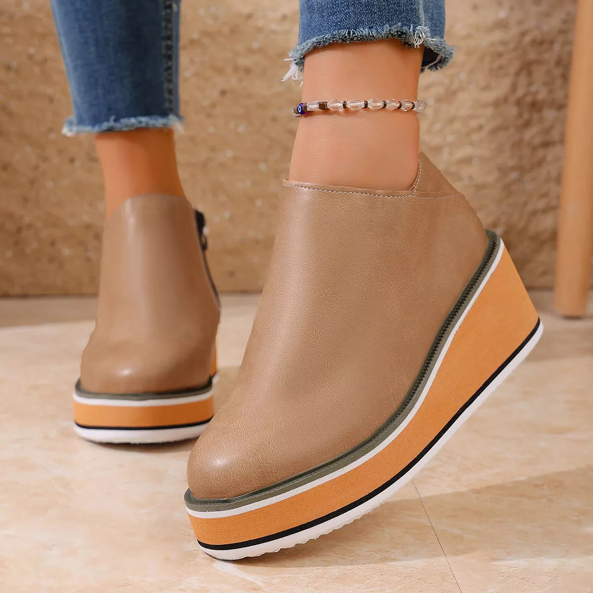 wedge ankle boots with zipper heel detail