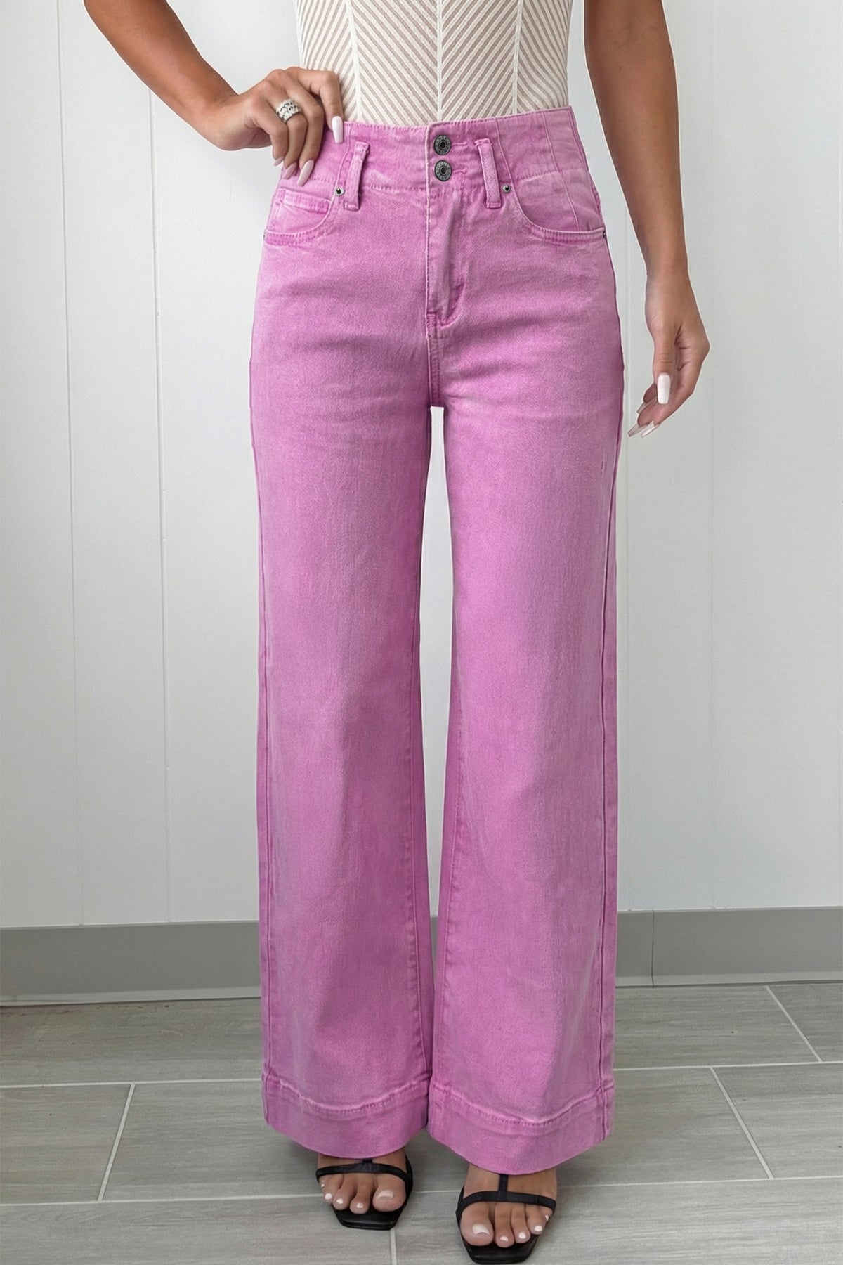 High waist wide leg jeans side view on model