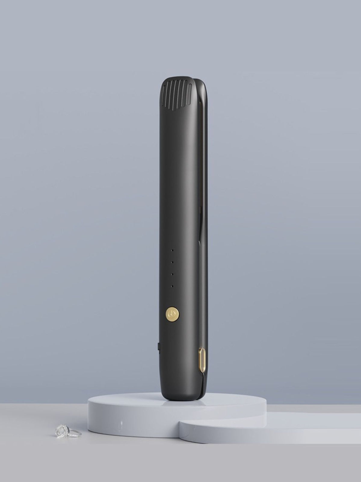 Cordless hair straightener in use
