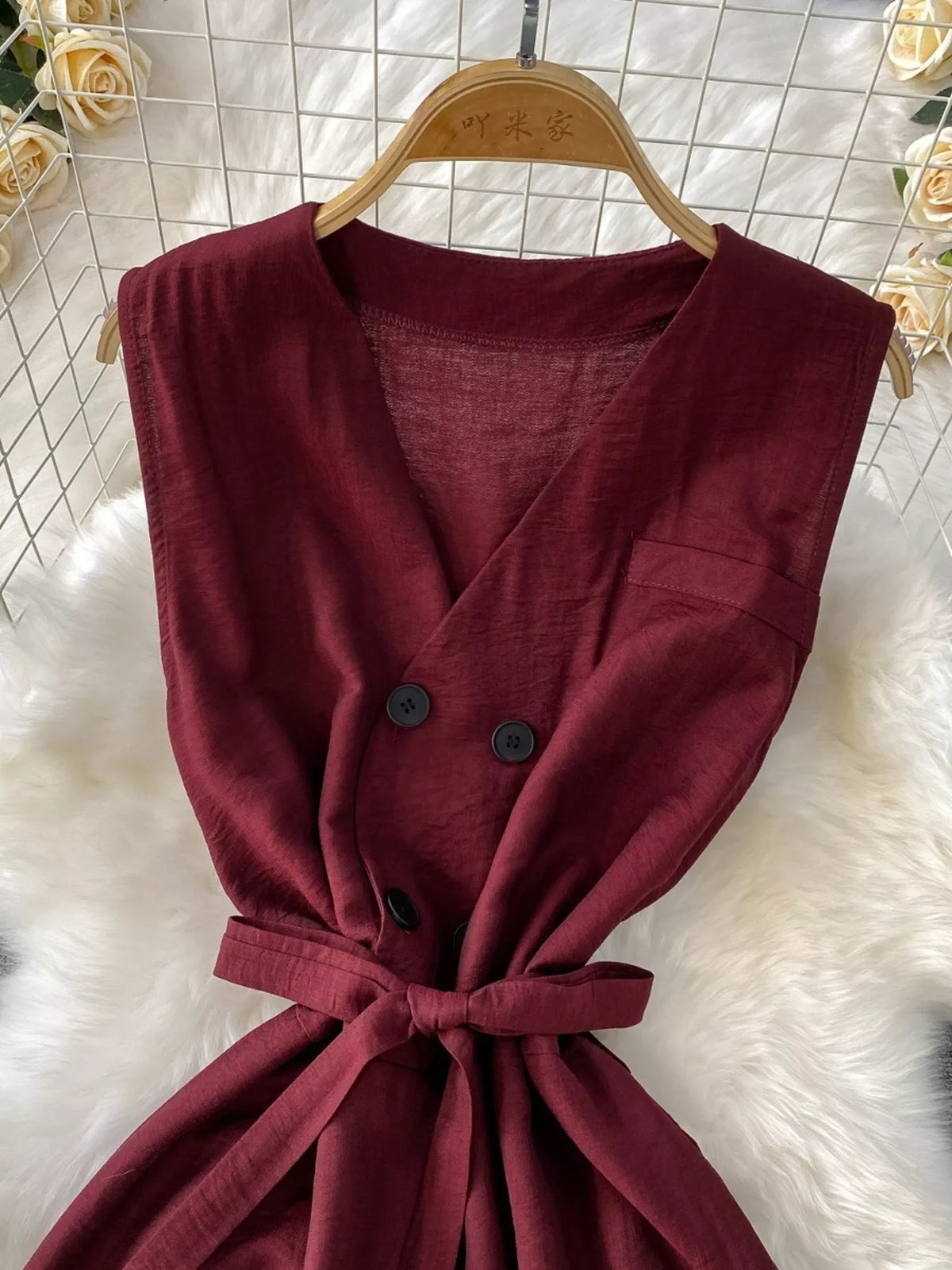 Burgundy wide leg jumpsuit side view