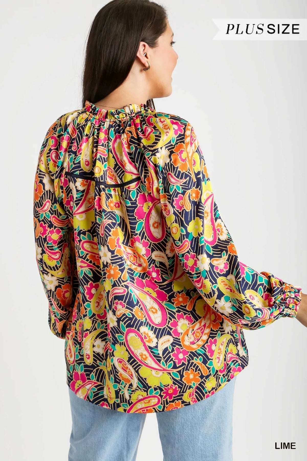 Full length view of ruffle neck button up shirt