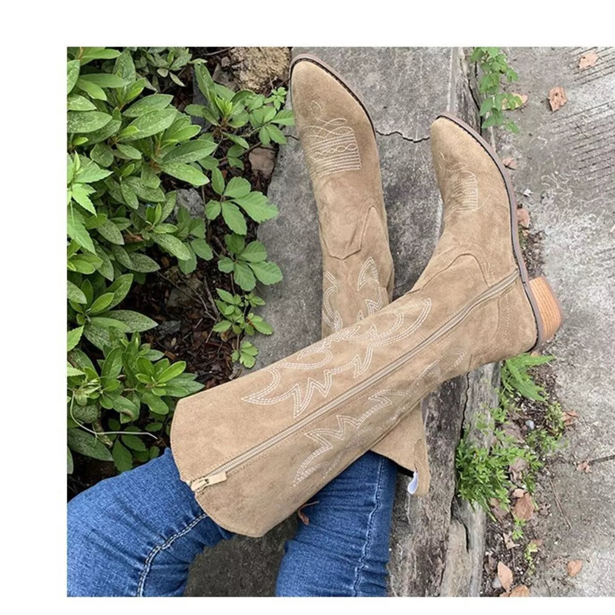 Point toe block heel suede boots close up detail