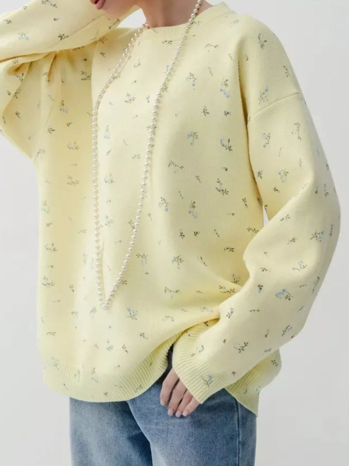 ribbed hem floral long sleeve sweater neckline detail