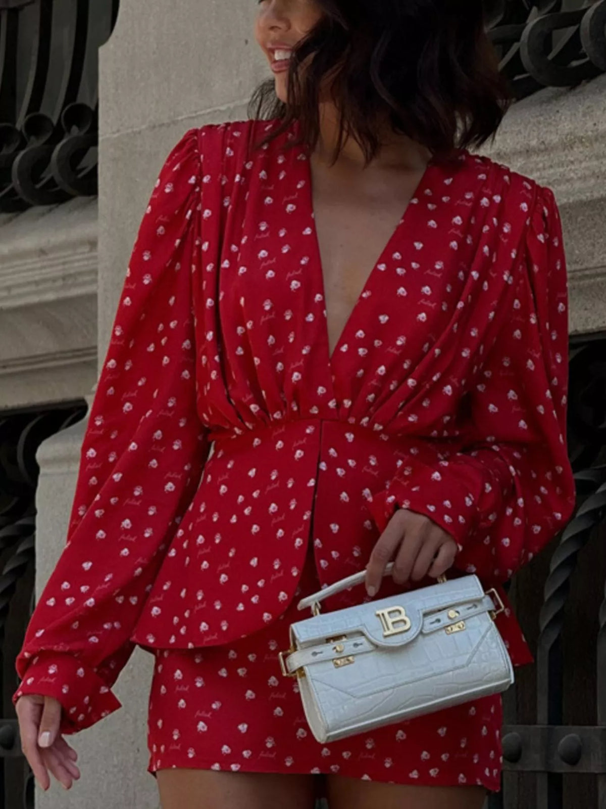 Long sleeve cuff detail on the polka dot tiered dress