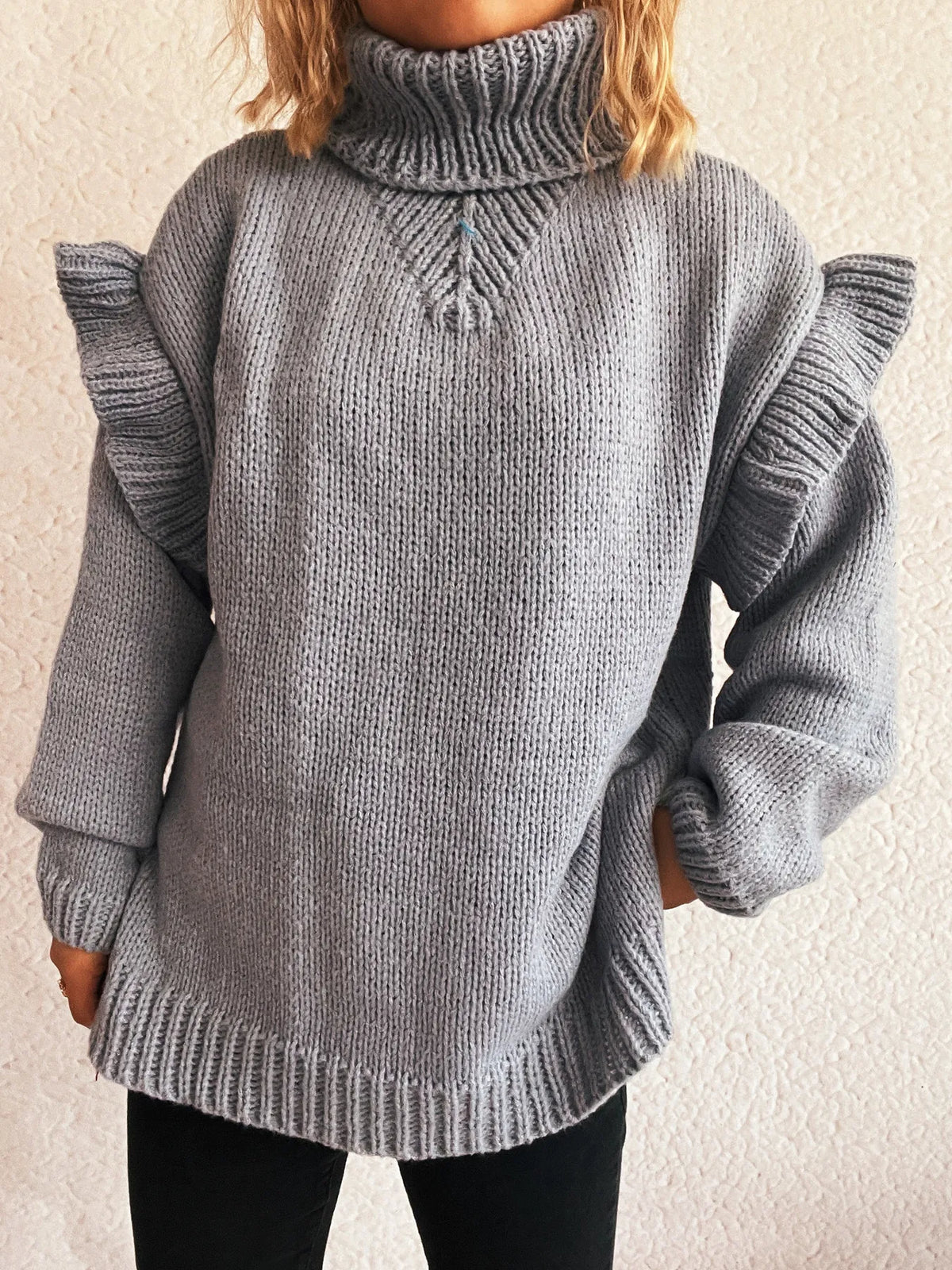 Ruffled turtleneck long sleeve sweater fabric detail